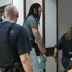 
              WNBA star and two-time Olympic gold medalist Brittney Griner leaves a courtroom after a hearing, in Khimki just outside Moscow, Russia, Monday, June 27, 2022. More than four months after she was arrested at a Moscow airport for cannabis possession, American basketball star Brittney Griner is to appear in court Monday for a preliminary hearing ahead of her trial. (AP Photo/Alexander Zemlianichenko)
            