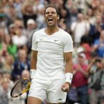 
              Spain's Rafael Nadal celebrates after beating Lithuania's Ricardas Berankis in a second round men's singles match on day four of the Wimbledon tennis championships in London, Thursday, June 30, 2022. (AP Photo/Kirsty Wigglesworth)
            