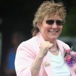 
              International Boxing Hall of Fame inductee class of 2020 Christy Martin poses for paradegoers during the annual Parade of Champions on Sunday, June 12, 2022, in Canastota, N.Y. (John Haeger/Standard-Speaker via AP)
            