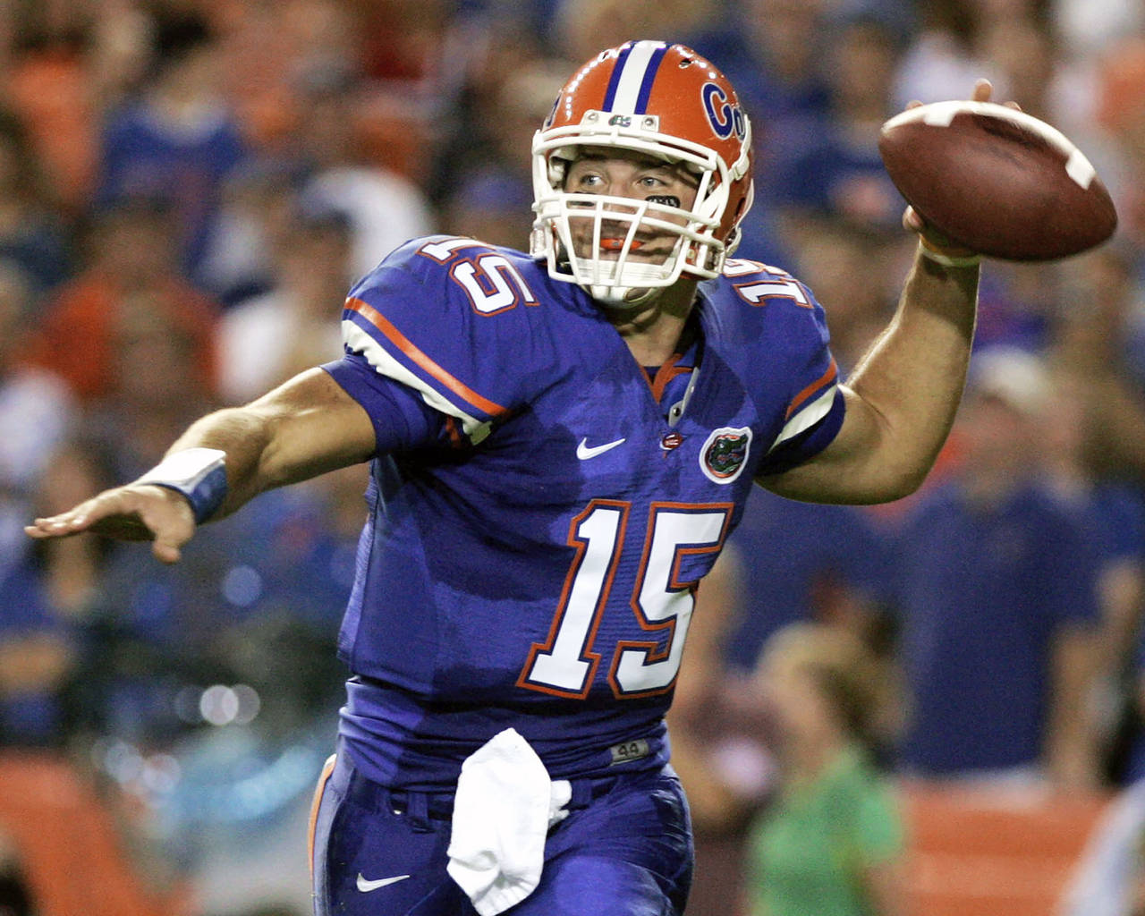 FILE - Florida quarterback Tim Tebow throws a pass during the first half of an NCAA college footbal...