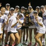 
              FILE - Vanderbilt posses with the trophy after their team won the NCAA's women's team tennis championships against Oklahoma, Tuesday, May 19, 2015, Waco, Texas. The number of women competing at the highest level of college athletics continues to rise along with an increasing funding gap between men’s and women’s sports programs, according to an NCAA report examining the 50th anniversary of Title IX. (AP Photo/LM Otero, File)
            