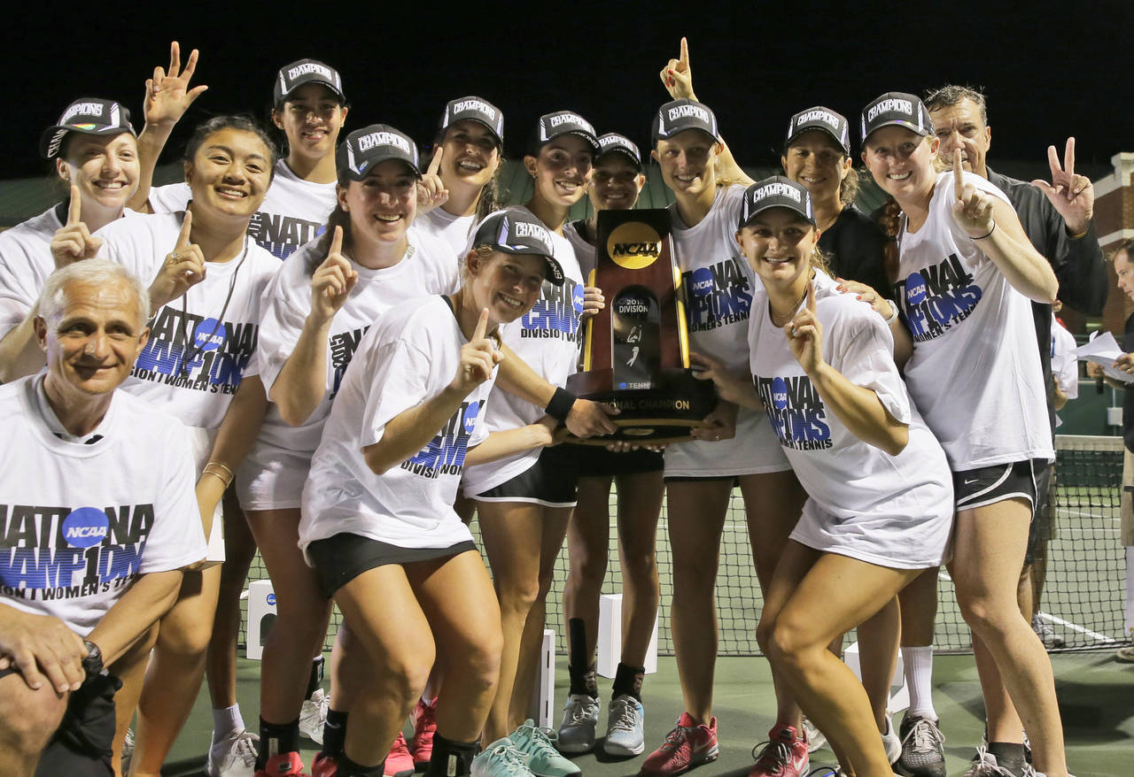 FILE - Vanderbilt posses with the trophy after their team won the NCAA's women's team tennis champi...