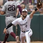 
              Texas A&M infielder Trevor Werner (28) beats a throw to first for a single as Louisville infielder Ben Bianco (6) catches a late throw during an NCAA college baseball super regional tournament game Saturday, June 11, 2022, in College Station, Texas. (AP Photo/Sam Craft)
            