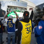 
              Golden State Warriors fans cheer on the team against the Boston Celtics during a watch party Thursday, June 16, 2022, in San Francisco for Game 6 of basketball's NBA Finals. (AP Photo/D. Ross Cameron)
            