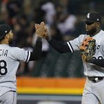 
              Chicago White Sox's Leury Garcia (28) celebrates with Luis Robert after the team's 5-1 win over the Detroit Tigers in a baseball game Tuesday, June 14, 2022, in Detroit. (AP Photo/Duane Burleson)
            