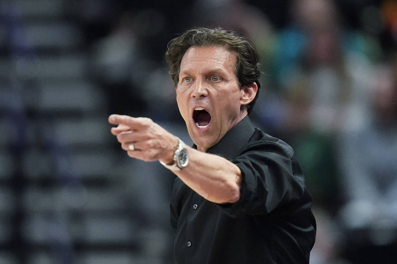 FILE - Utah Jazz coach Quin Snyder shouts to the team during the second half of an NBA basketball g...