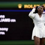 
              Serena Williams of the US reacts as she plays France's Harmony Tan in a first round women’s singles match on day two of the Wimbledon tennis championships in London, Tuesday, June 28, 2022. (John Walton/PA via AP)
            