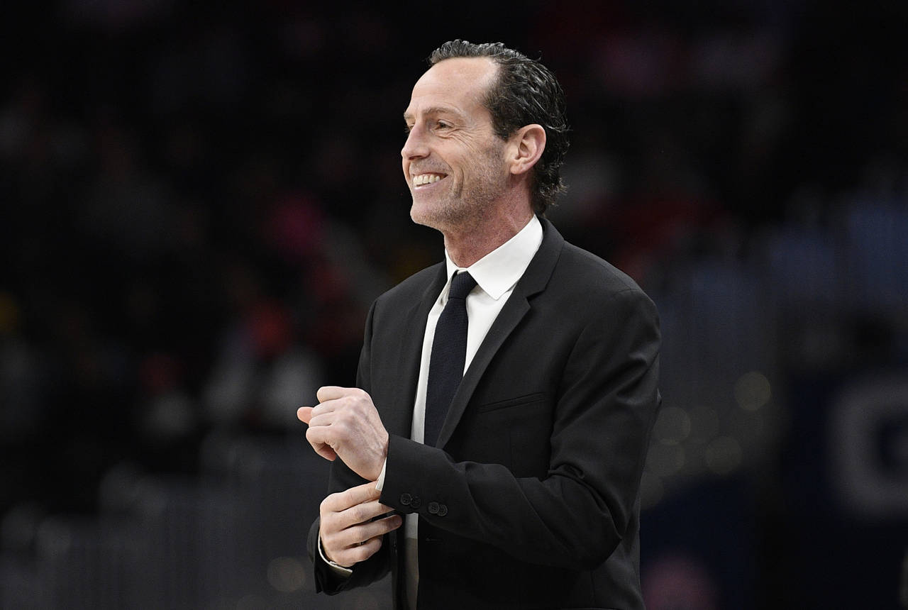 FILE - Brooklyn Nets coach Kenny Atkinson watches during the first half of the team's NBA basketbal...
