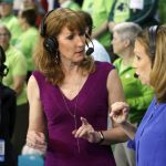 
              FILE - In this Sunday, March 5, 2017 photo, Debbie Antonelli, center, a women's college basketball analyst for ESPN, talks with play-by-play announcer Beth Mowins, right, before the start of the women's basketball game between Duke and Notre Dame at the NCAA college basketball game in the championship of the Atlantic Coast Conference tournament at the HTC Center in Conway, S.C., Sunday, March 5, 2017. Some of the giants of women’s basketball say if not for Title IX, doors would not have been open for them to blaze trails to Hall of Fame careers on and off the court, but sound complacency alarms when it comes to future of the law. (AP Photo/Mic Smith, File)
            