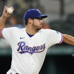 
              Texas Rangers starting pitcher Dane Dunning throws during the first inning of the team's baseball game against the Houston Astros in Arlington, Texas, Tuesday, June 14, 2022. (AP Photo/LM Otero)
            