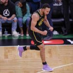 
              Golden State Warriors' Stephen Curry, 30, reacts after hitting a three pointer during the fourth quarter of Game 4 of basketball's NBA Finals, in Boston, Mass., on Friday, June 10, 2022. (Carlos Avila Gonzalez/San Francisco Chronicle via AP)
            