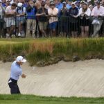 
              Will Zalatoris hits on the 18th hole during the third round of the U.S. Open golf tournament at The Country Club, Saturday, June 18, 2022, in Brookline, Mass. (AP Photo/Charlie Riedel)
            