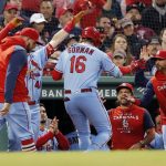 
              St. Louis Cardinals' Nolan Gorman (16) is congratulated for his solo home run during the fourth inning of the team's baseball game against the Boston Red Sox, Saturday, June 18, 2022, in Boston. (AP Photo/Michael Dwyer)
            