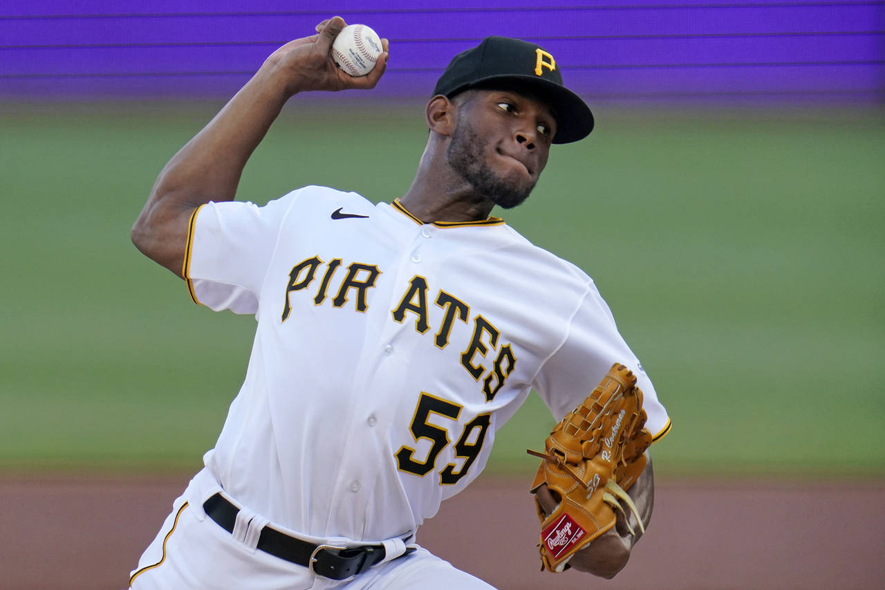 Pittsburgh Pirates starting pitcher Roansy Contreras delivers during the first inning of a baseball...