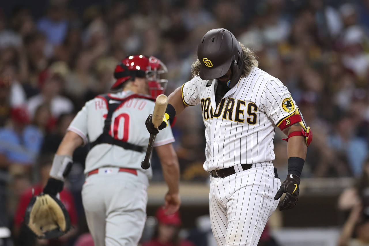San Diego Padres' Jorge Alfaro reacts after striking out against the Philadelphia Phillies during t...