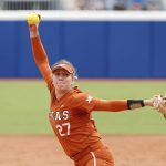 
              Texas starting pitcher Hailey Dolcini (27) pitches in the second inning of an NCAA softball Women's College World Series game against UCLA on Thursday, June 2, 2022, in Oklahoma City. (AP Photo/Alonzo Adams)
            