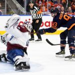 
              Colorado Avalanche goalie Pavel Francouz (39) is scored on by Edmonton Oilers' Ryan Nugent-Hopkins (93) during second period NHL hockey conference finals action in Edmonton, Alberta, on Monday, June 6, 2022. (Jason Franson/The Canadian Press via AP)
            