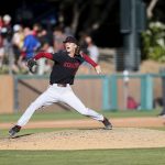 
              Stanford's Quinn Mathews pitches against Connecticut during the eighth inning of an NCAA college baseball super regional game on Sunday, June 12, 2022, in Stanford, Calif. (AP Photo/Kavin Mistry)
            