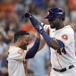
              Houston Astros' Yordan Alvarez (44) celebrates with Jose Altuve after hitting a home run against the New York Mets during the third inning of a baseball game Wednesday, June 22, 2022, in Houston. (AP Photo/David J. Phillip)
            