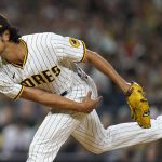 
              San Diego Padres starting pitcher Yu Darvish works against a New York Mets batter during the seventh inning of a baseball game Tuesday, June 7, 2022, in San Diego. (AP Photo/Gregory Bull)
            