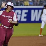 
              Oklahoma's Jocelyn Alo (78) gestures to fans as she runs the bases on a home run against Texas during the fifth inning of the first game of the NCAA Women's College World Series softball finals Wednesday, June 8, 2022, in Oklahoma City. (AP Photo/Sue Ogrocki)
            
