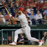 
              Philadelphia Phillies' Bryce Harper doubles in the eighth inning of the second game of a baseball doubleheader against the Washington Nationals, Friday, June 17, 2022, in Washington. J.T. Realmuto and Kyle Schwarber scored on the play, and Philadelphia won 8-7 in 10 innings. (AP Photo/Patrick Semansky)
            
