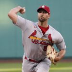 
              St. Louis Cardinals starting pitcher Adam Wainwright throws during the first inning of the team's baseball game against the Boston Red Sox at Fenway Park, Friday, June 17, 2022, in Boston. (AP Photo/Mary Schwalm)
            