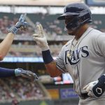 
              Tampa Bay Rays' Isaac Paredes, right, is congratulated by Brett Phillips, left, after hitting a home run against the Minnesota Twins during the second inning of a baseball game Friday, June 10, 2022, in Minneapolis. (AP Photo/Stacy Bengs)
            