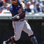 
              Minnesota Twins' Gary Sanchez hits a single against the Cleveland Guardians during the fourth inning in the first baseball game of a doubleheader, Tuesday, June 28, 2022, in Cleveland. (AP Photo/Ron Schwane)
            