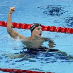 
              FILE - Caeleb Dressel, of the United States, celebrates after winning the gold medal in the men's 50-meter freestyle final at the 2020 Summer Olympics, Aug. 1, 2021, in Tokyo, Japan. The world swimming championships start in Budapest on Saturday June 18, 2022, where Caeleb Dressel is going for his third consecutive world titles in the 50, 100 free and 100 butterfly. (AP Photo/Jae C. Hong, File)
            