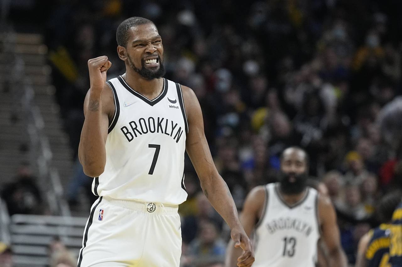 FILE - Brooklyn Nets' Kevin Durant reacts during the second half of an NBA basketball game against ...