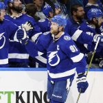 
              Tampa Bay Lightning center Steven Stamkos (91) celebrates with the bench after his goal against the New York Rangers during the third period in Game 3 of the NHL hockey Stanley Cup playoffs Eastern Conference finals Sunday, June 5, 2022, in Tampa, Fla. (AP Photo/Chris O'Meara)
            