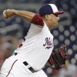 
              Washington Nationals pitcher Erasmo Ramírez delivers during the first inning of a baseball game against the Atlanta Braves, Monday, June 13, 2022, in Washington. (AP Photo/Luis M. Alvarez)
            