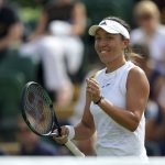 
              Jessica Pegula of the US celebrates after beating Britain's Harriet Dart  in a second round women's single match on day four of the Wimbledon tennis championships in London, Thursday, June 30, 2022. (Zac Goodwin/PA via AP)
            