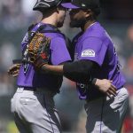 
              Colorado Rockies catcher Brian Serven, left, celebrates with pitcher Alex Colome after the Rockies defeated the San Francisco Giants in a baseball game in San Francisco, Thursday, June 9, 2022. (AP Photo/Jeff Chiu)
            