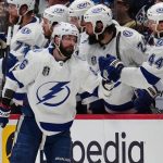 
              Tampa Bay Lightning right wing Nikita Kucherov (86) is congratulated for his goal against the Colorado Avalanche during the second period in Game 5 of the NHL hockey Stanley Cup Final, Friday, June 24, 2022, in Denver. (AP Photo/Jack Dempsey)
            