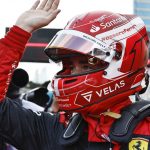 
              Ferrari driver Charles Leclerc of Monaco celebrates after setting the pole position in the qualifying session at the Baku circuit, in Baku, Azerbaijan, Saturday, June 11, 2022. The Formula One Grand Prix will be held on Sunday. (Hamad Mohammed, Pool Via AP)
            