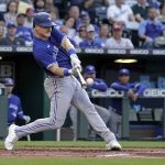 
              Toronto Blue Jays' Matt Chapman hits a two-run double during the second inning of a baseball game against the Kansas City Royals Tuesday, June 7, 2022, in Kansas City, Mo. (AP Photo/Charlie Riedel)
            