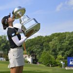 
              In Gee Chun, of South Korea, kisses the winners trophy, after winning the KPMG Women's PGA Championship golf tournament at Congressional Country Club, Sunday, June 26, 2022, in Bethesda, Md. (AP Photo/Terrance Williams)
            