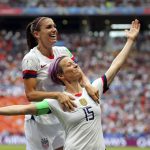 
              FILE - United States' Megan Rapinoe, right, celebrates after scoring the opening goal from the penalty spot during the Women's World Cup final soccer match between the United States and Netherlands at the Stade de Lyon in Decines, outside Lyon, France, July 7, 2019. (AP Photo/Francisco Seco, File)
            