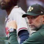 
              Oakland Athletics manager Mark Kotsay watches from the dugout during the team's baseball game against the Atlanta Braves Wednesday, June 8, 2022, in Atlanta. (AP Photo/John Bazemore)
            