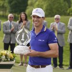 
              Billy Horschel poses with his trophy after winning the Memorial golf tournament Sunday, June 5, 2022, in Dublin, Ohio. (AP Photo/Darron Cummings)
            