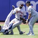
              Houston Astros' Jake Meyers (6) watches as Jeremy Pena, left, and Yordan Alvarez (44) fall to the ground after colliding catching a fly ball by New York Mets' Dominic Smith during the eighth inning of a baseball game, Wednesday, June 29, 2022, in New York. (AP Photo/Mary Altaffer)
            