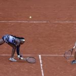 
              Coco Gauff of the U.S., left, and Jessica Pegula of the U.S. return the ball to France's Caroline Garcia and France's Kristina Mladenovic during their women doubles final match of the French Open tennis tournament at the Roland Garros stadium Sunday, June 5, 2022 in Paris. (AP Photo/Jean-Francois Badias)
            