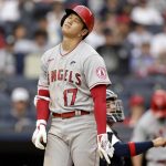 
              Los Angeles Angels' Shohei Ohtani reacts after being called out on strikes during the eighth inning of the first baseball game of a doubleheader against the New York Yankees on Thursday, June 2, 2022, in New York. (AP Photo/Adam Hunger)
            