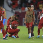
              Peru's players stand dejected after losing in a penalty shoot-out during the World Cup 2022 qualifying play-off soccer match between Australia and Peru in Al Rayyan, Qatar, Monday, June 13, 2022. (AP Photo/Hussein Sayed)
            