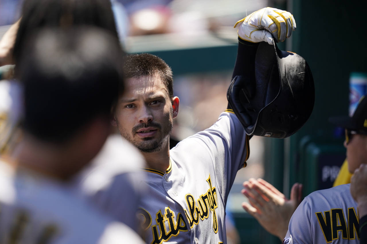 Pittsburgh Pirates' Bryan Reynolds celebrates his two-run homer during the first inning of a baseba...
