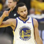 
              Golden State Warriors guard Stephen Curry (30) celebrates during the second half of Game 5 of basketball's NBA Finals against the Boston Celtics in San Francisco, Monday, June 13, 2022. (AP Photo/Jed Jacobsohn)
            