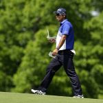 
              Hideki Matsuyama, of Japan, walks on the ninth fairway during the first round of the Memorial golf tournament, Thursday, June 2, 2022, in Dublin, Ohio. (AP Photo/Darron Cummings)
            