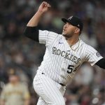 
              Colorado Rockies relief pitcher Carlos Estevez works against the San Diego Padres in the eighth inning of a baseball game Friday, June 17, 2022, in Denver. (AP Photo/David Zalubowski)
            